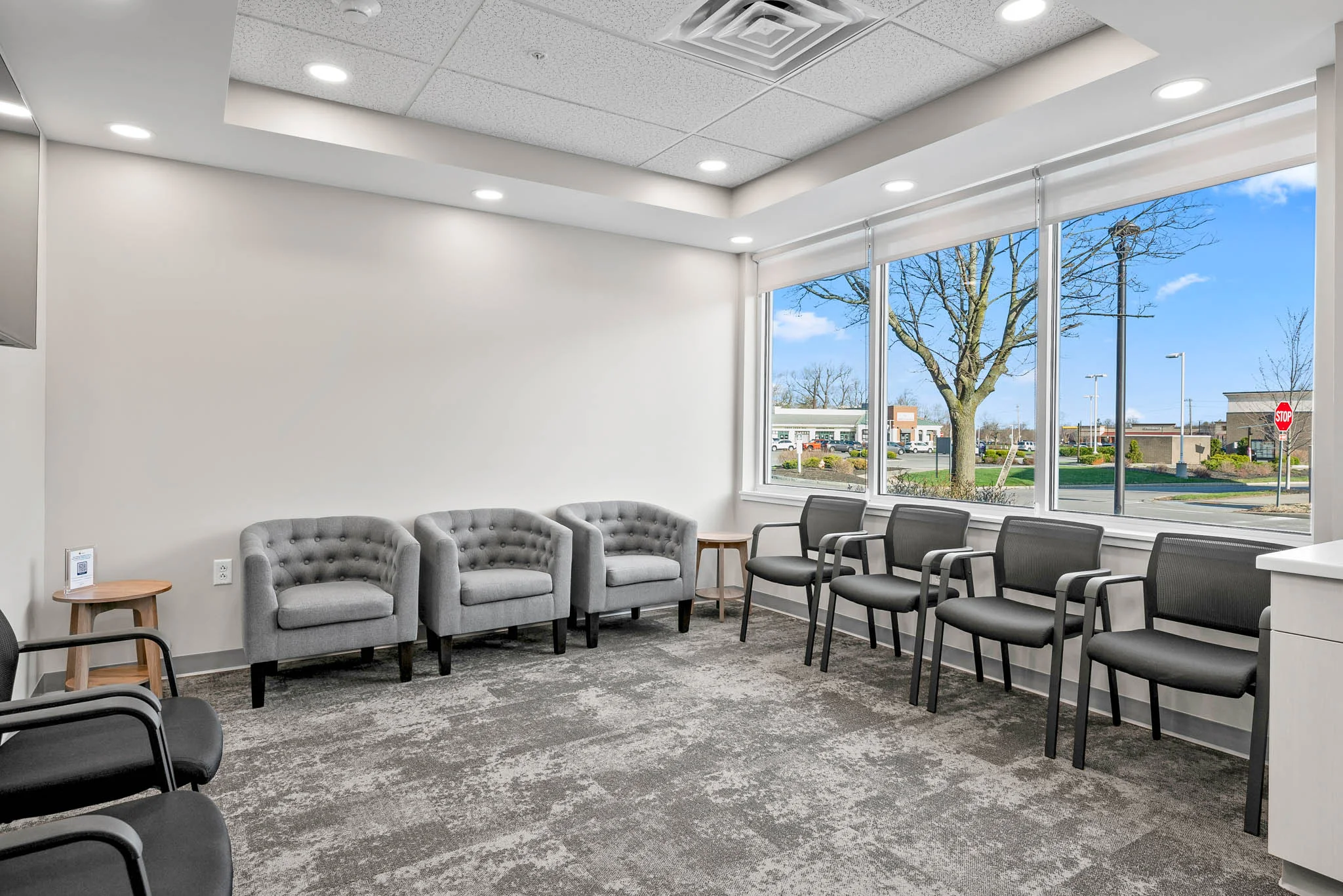 Bright Spruce Grove Dental waiting room with large windows
